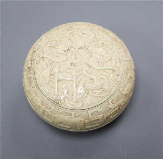 A Chinese carved ivory circular dragon box, early 20th century height 4cm